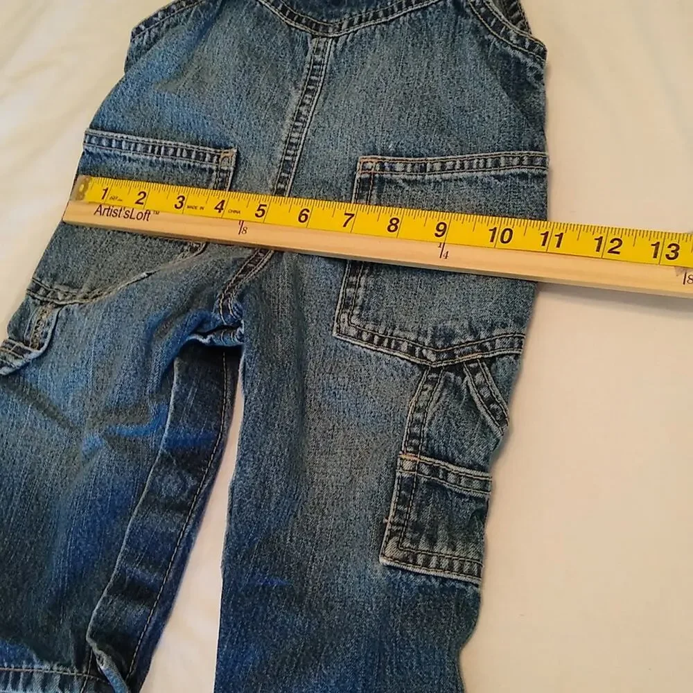 Oshkosh girls Size 9 months denim overalls.